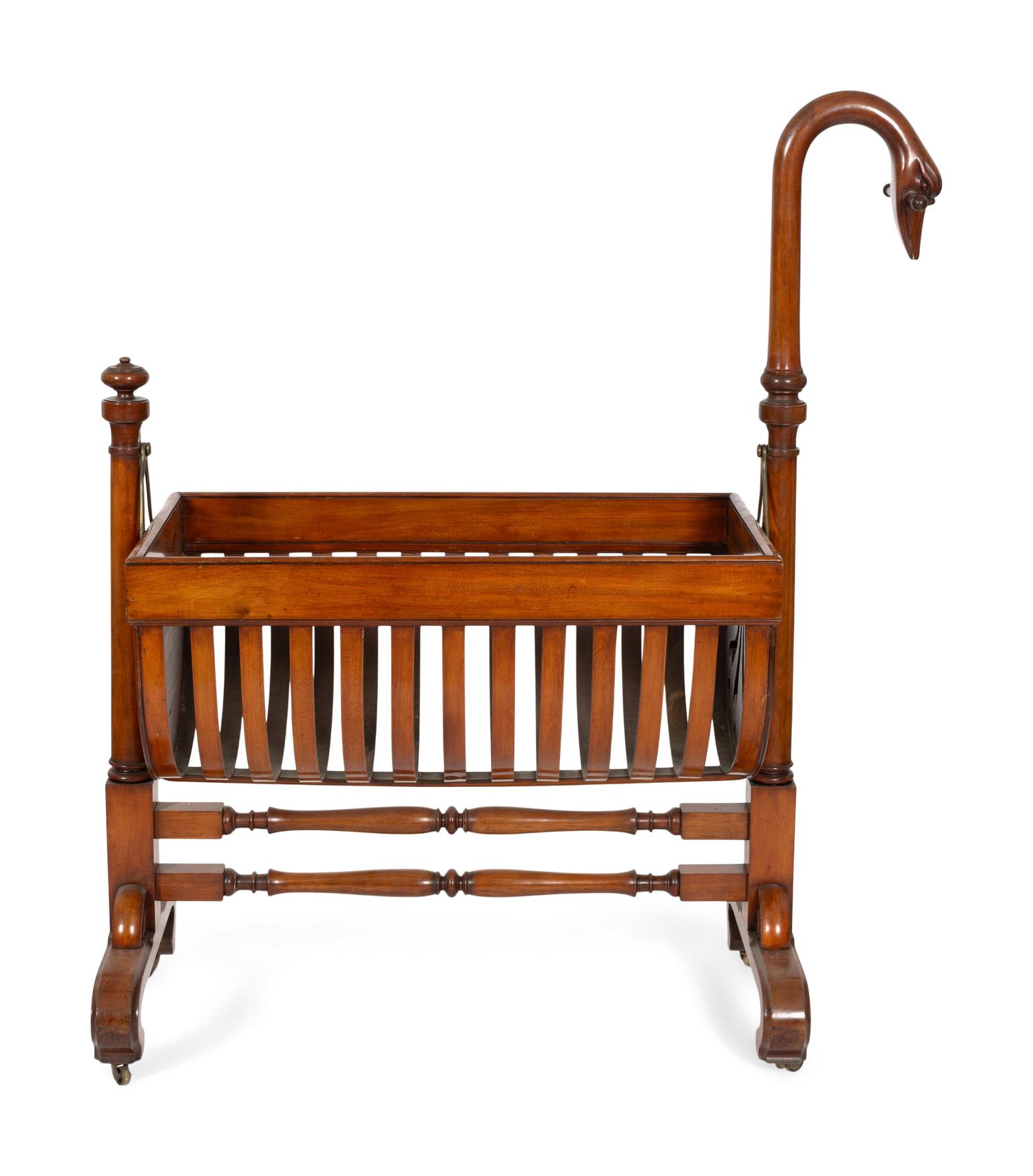 A Biedermeier Mahogany Rocking Crib