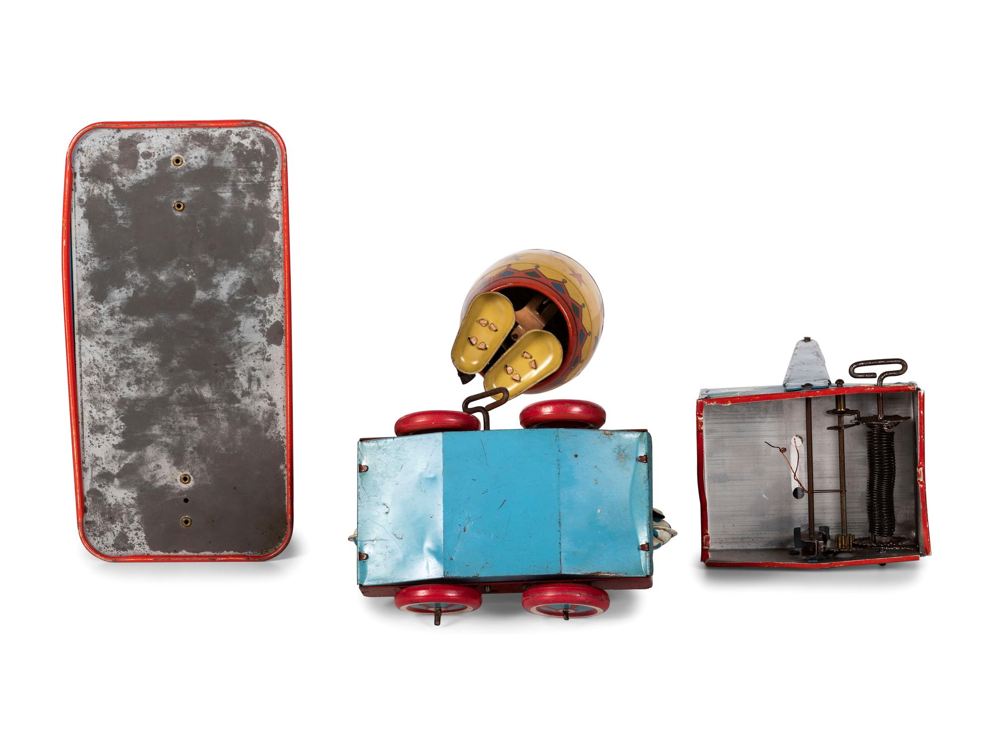 Four Tin Circus and Clown Toys