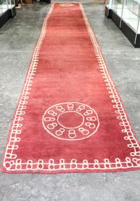 A Chinese Style Wool Rug 26 feet 2 1/2 inches x 4 feet 3 inches. — 20TH CENTURY