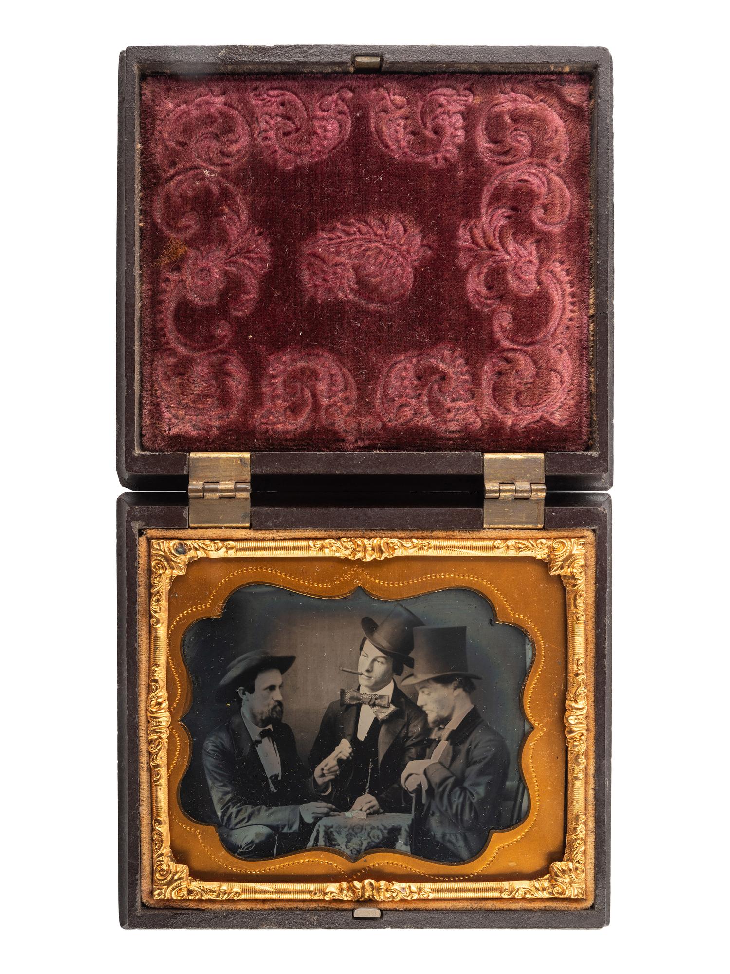 [EARLY PHOTOGRAPHY]. Sixth plate ambrotype of three young swells gambling.