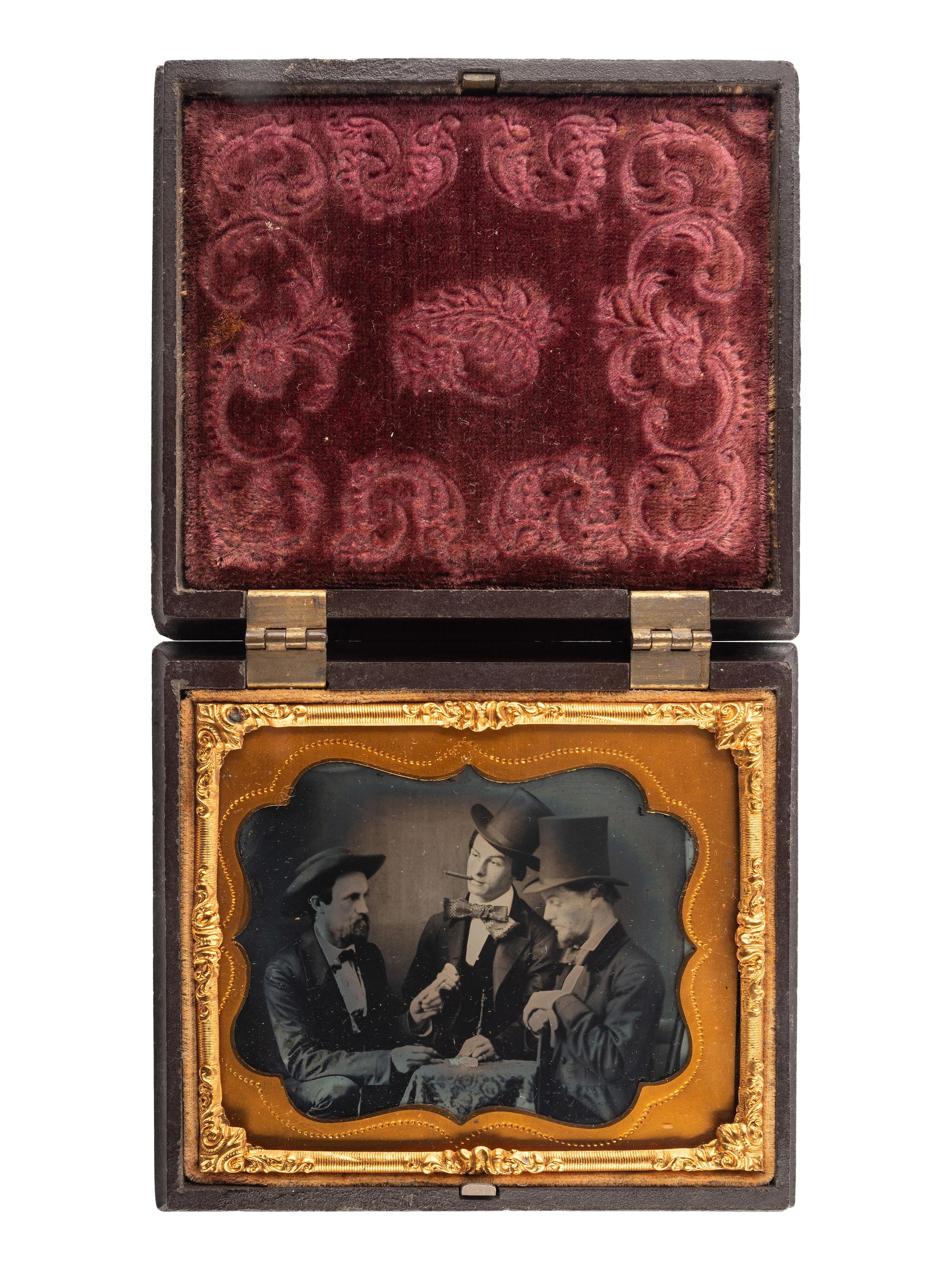 [EARLY PHOTOGRAPHY]. Sixth plate ambrotype of three young swells gambling.