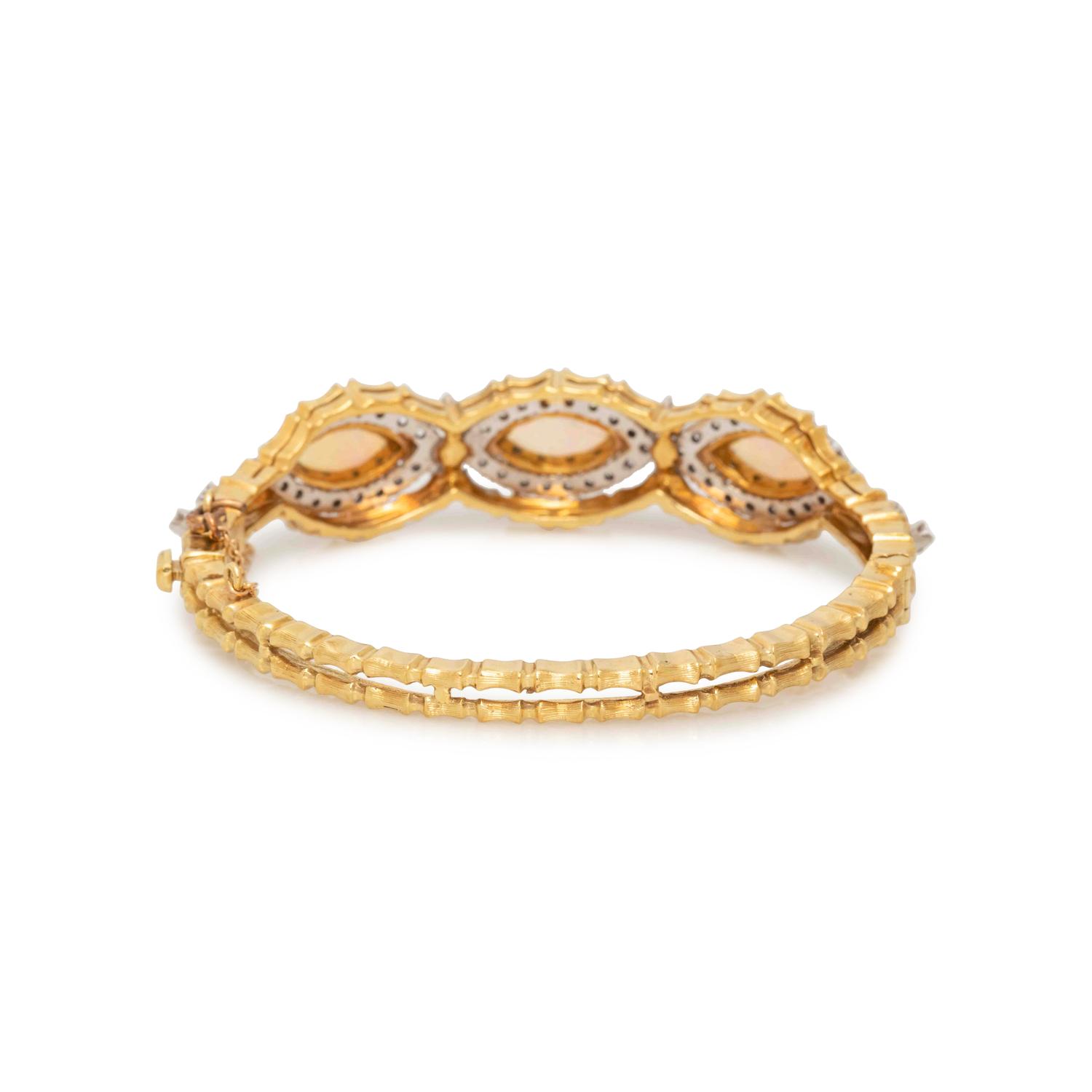 YELLOW GOLD, OPAL AND DIAMOND BANGLE BRACELET
