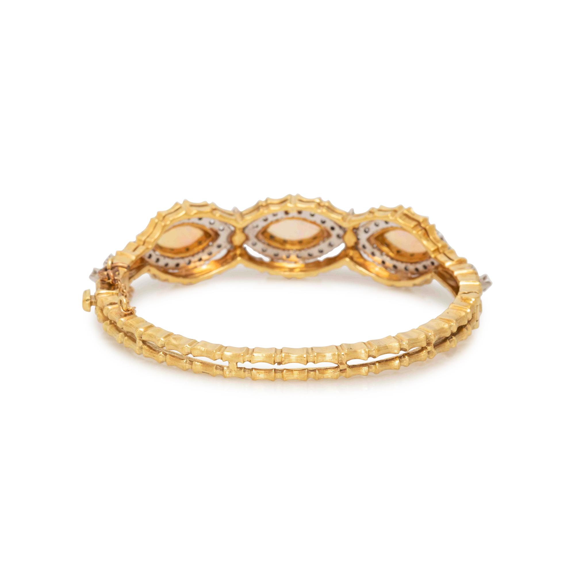 YELLOW GOLD, OPAL AND DIAMOND BANGLE BRACELET