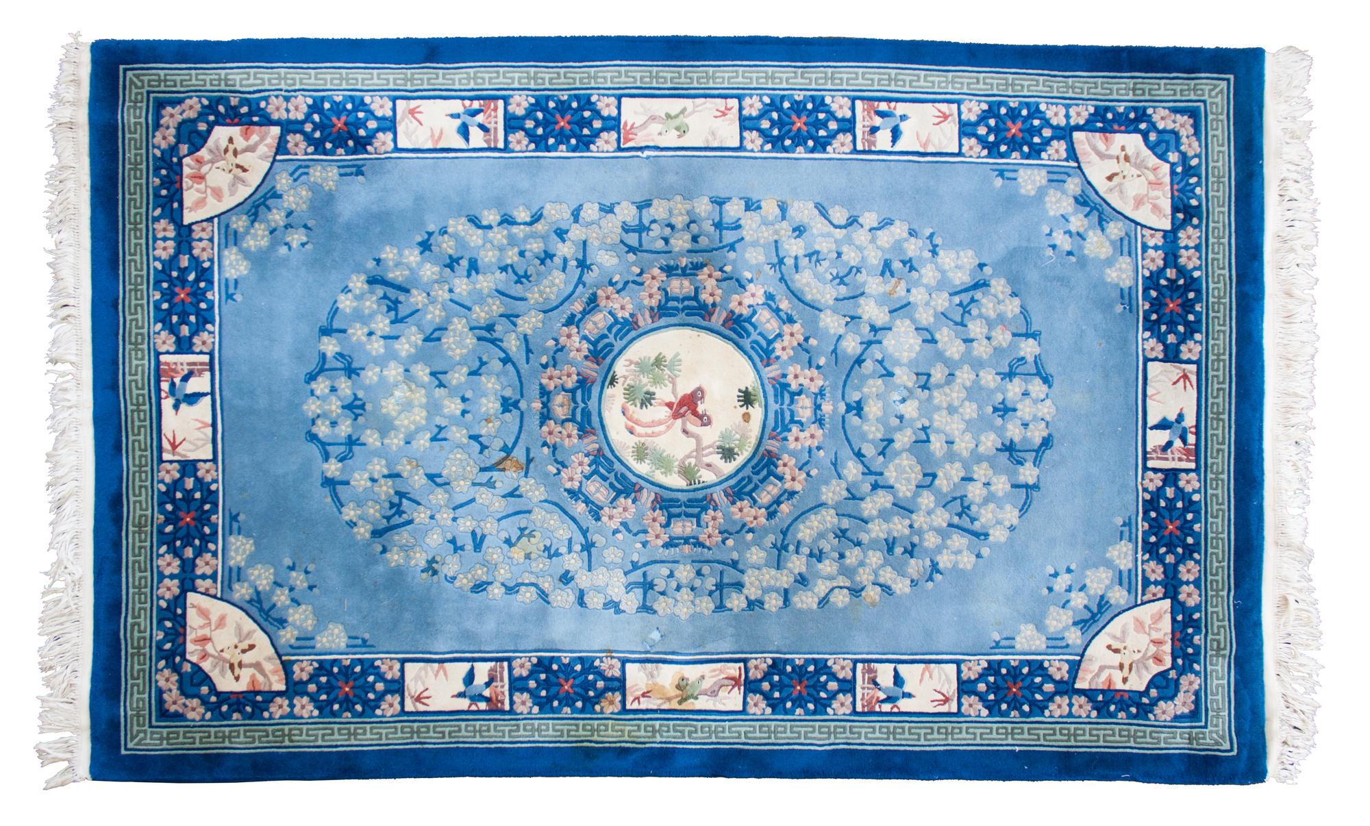 A Chinese Wool Rug Approx. 8 feet x 10 feet. — 20TH CENTURY
