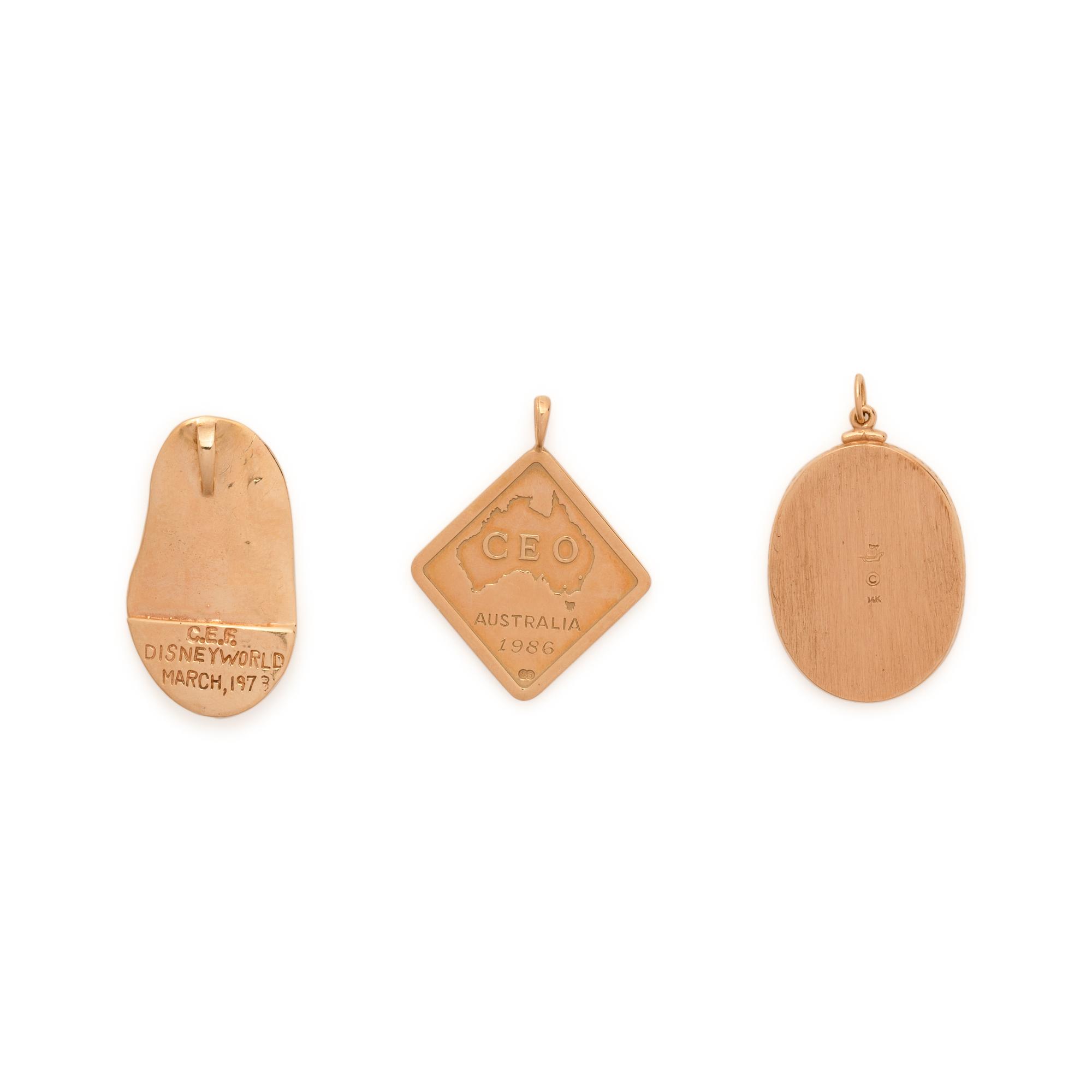 COLLECTION OF YELLOW GOLD CHARMS