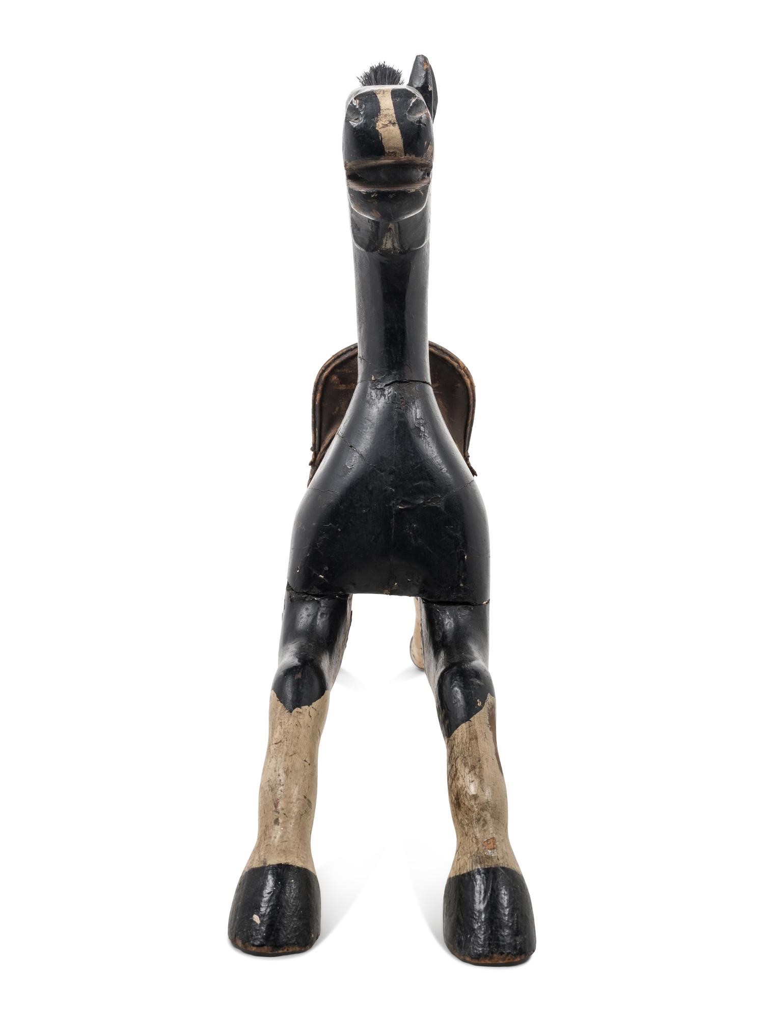 A Painted Wood Toy Horse