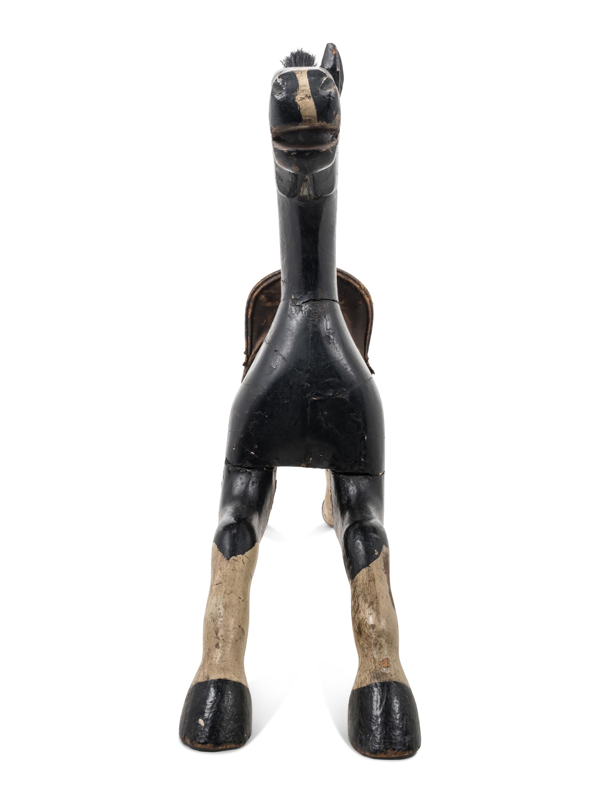 A Painted Wood Toy Horse