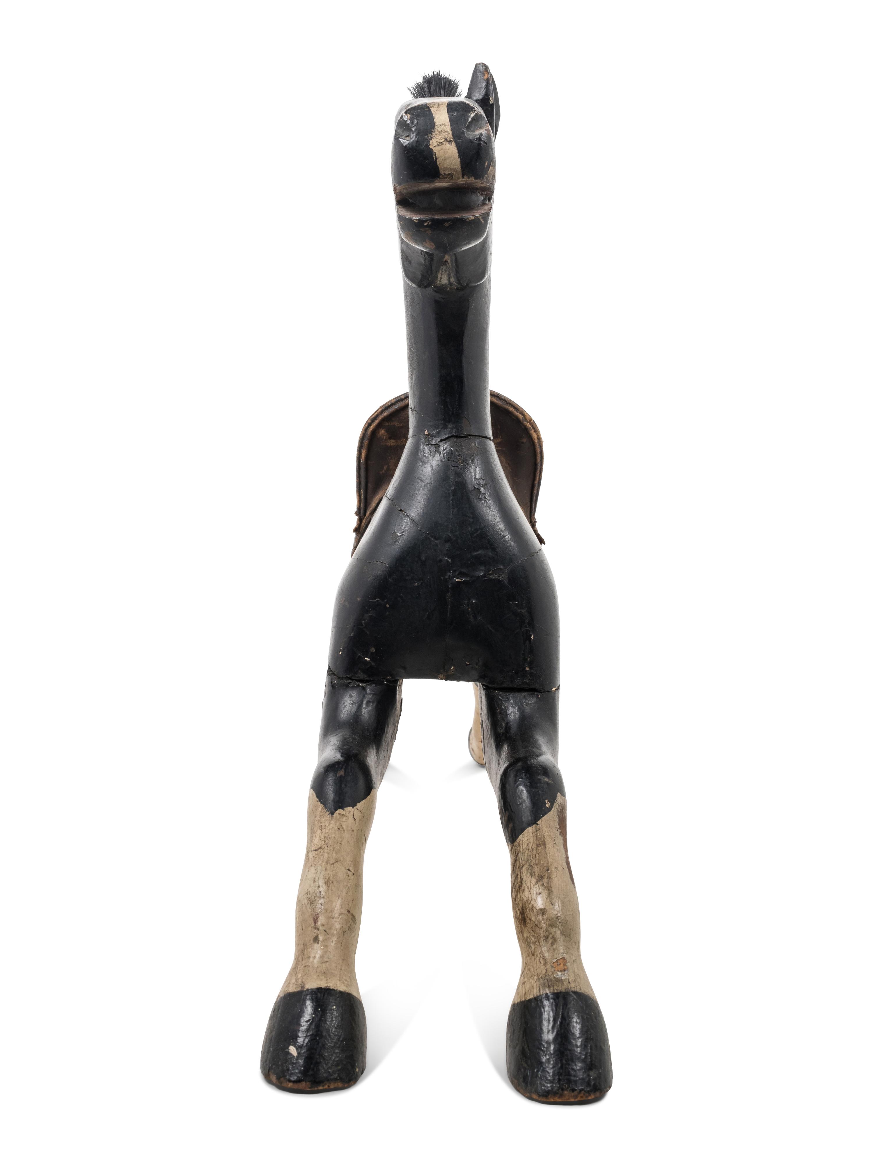 A Painted Wood Toy Horse
