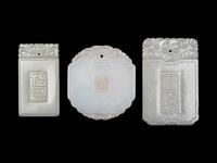 Five Chinese Carved Celadon Jade Pendants