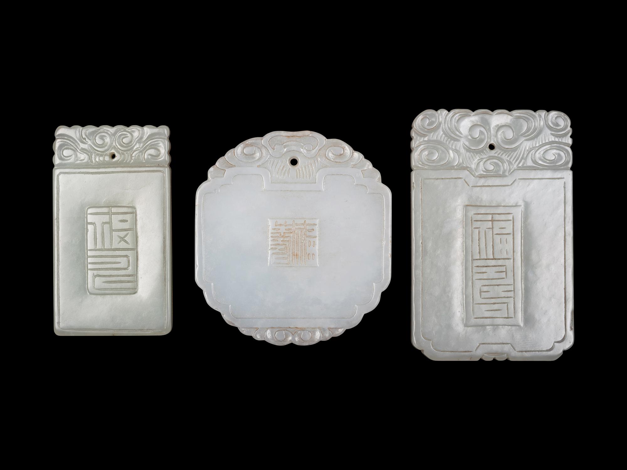 Five Chinese Carved Celadon Jade Pendants