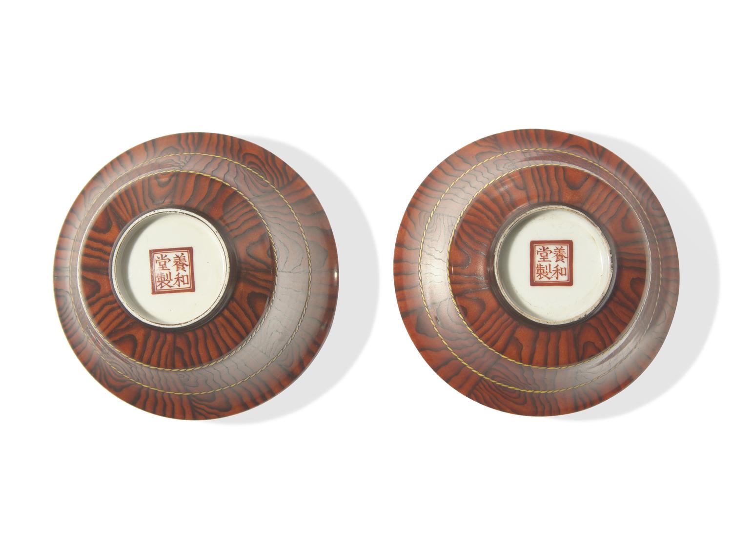 A Pair of Chinese Faux Bois Porcelain Erotic Tea Bowls, Covers, and Stands