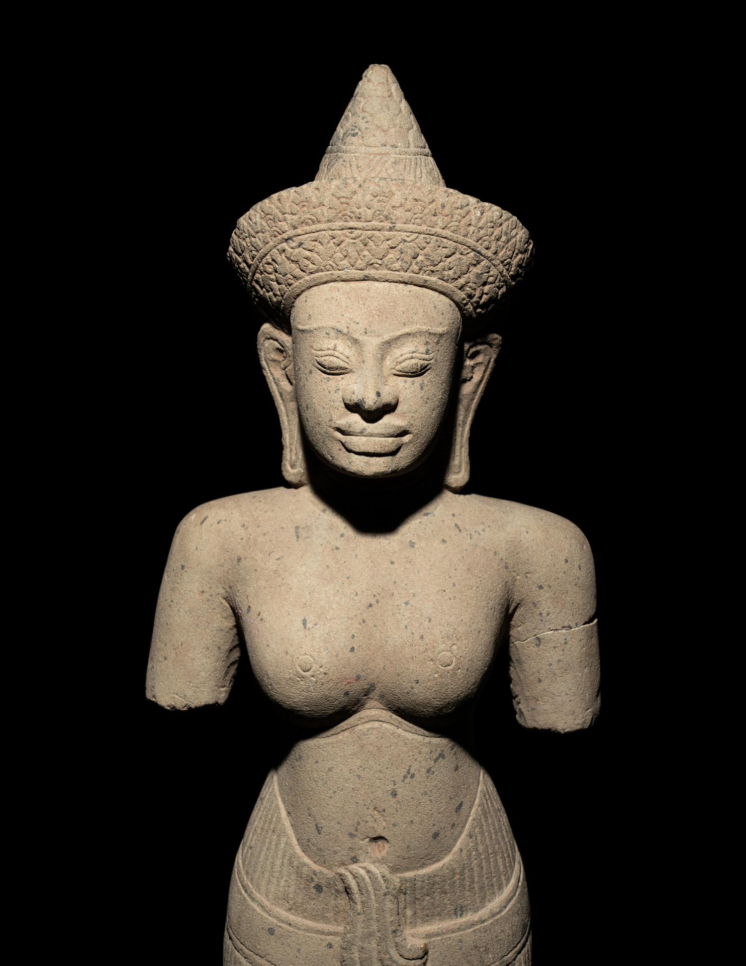 A Khmer Sandstone Figure of a Deity