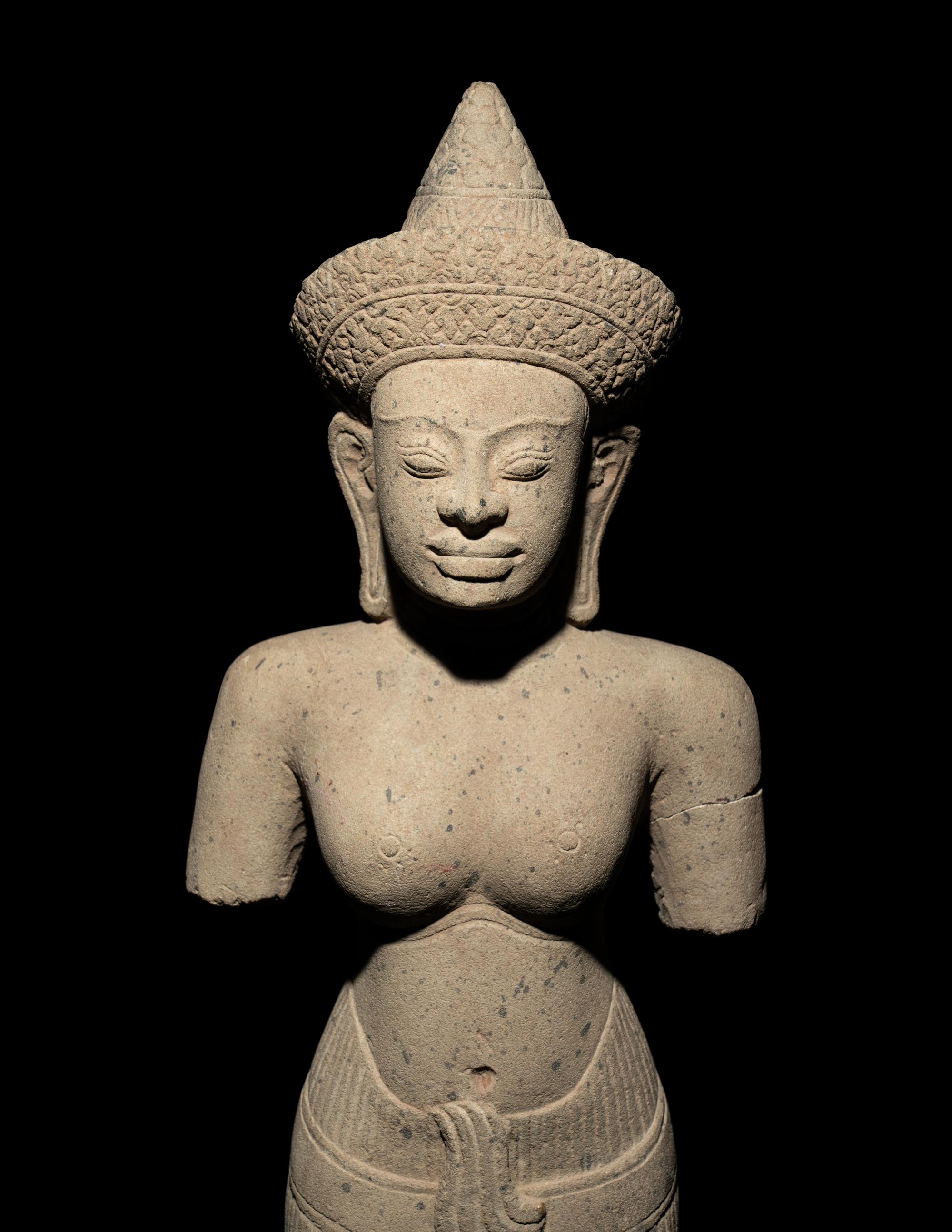 A Khmer Sandstone Figure of a Deity