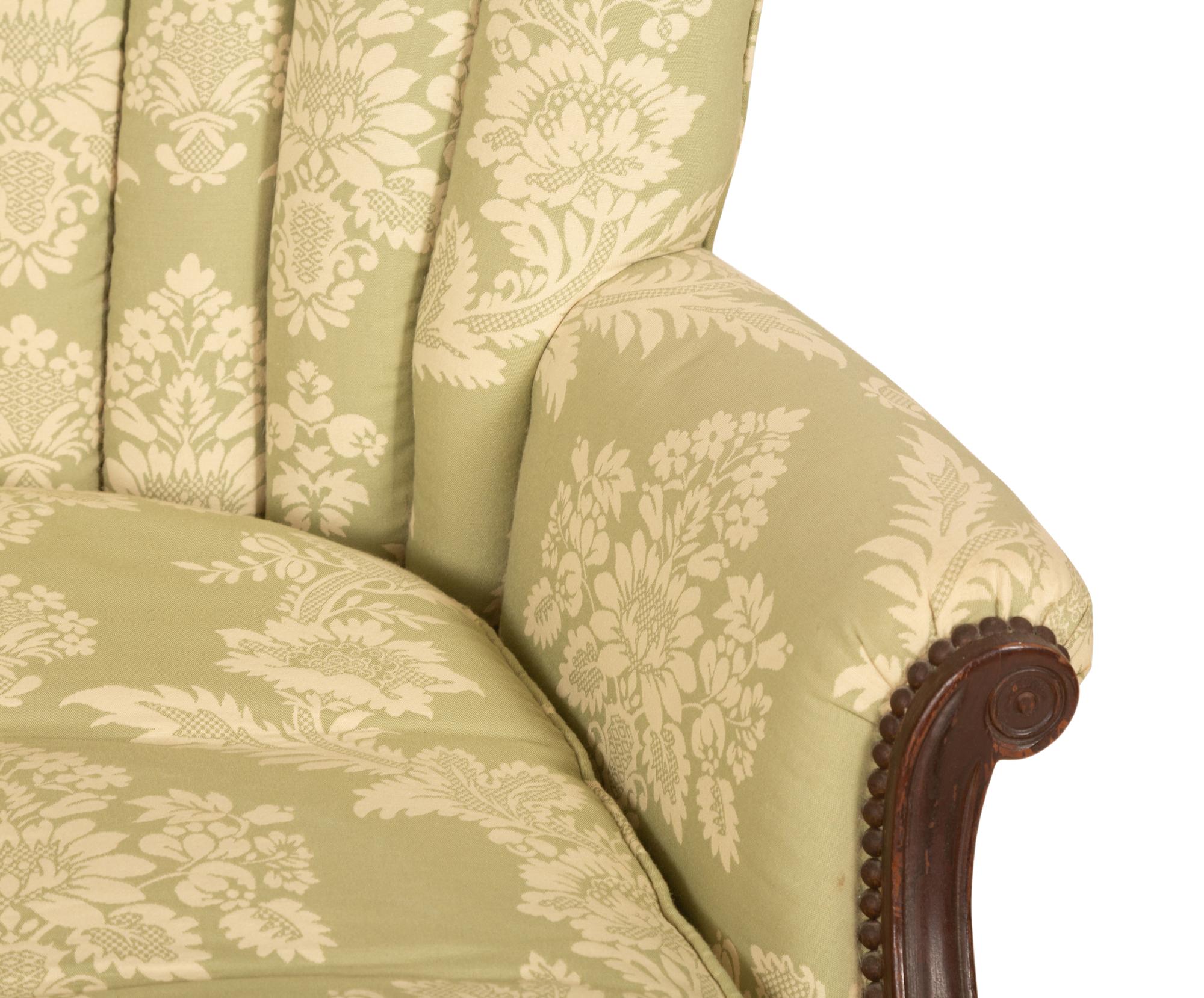 A Green and White Channel Upholstered Mahogany Armchair