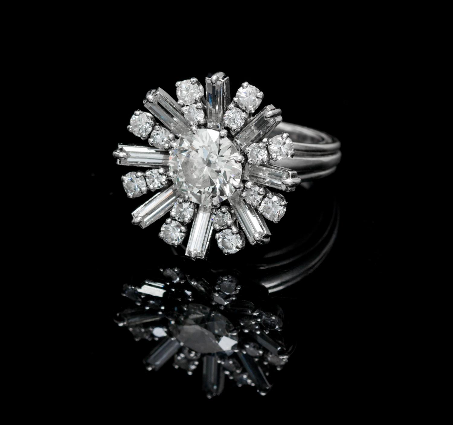 A Platinum, White Gold and Diamond Ring, French, 7.80 dwts.