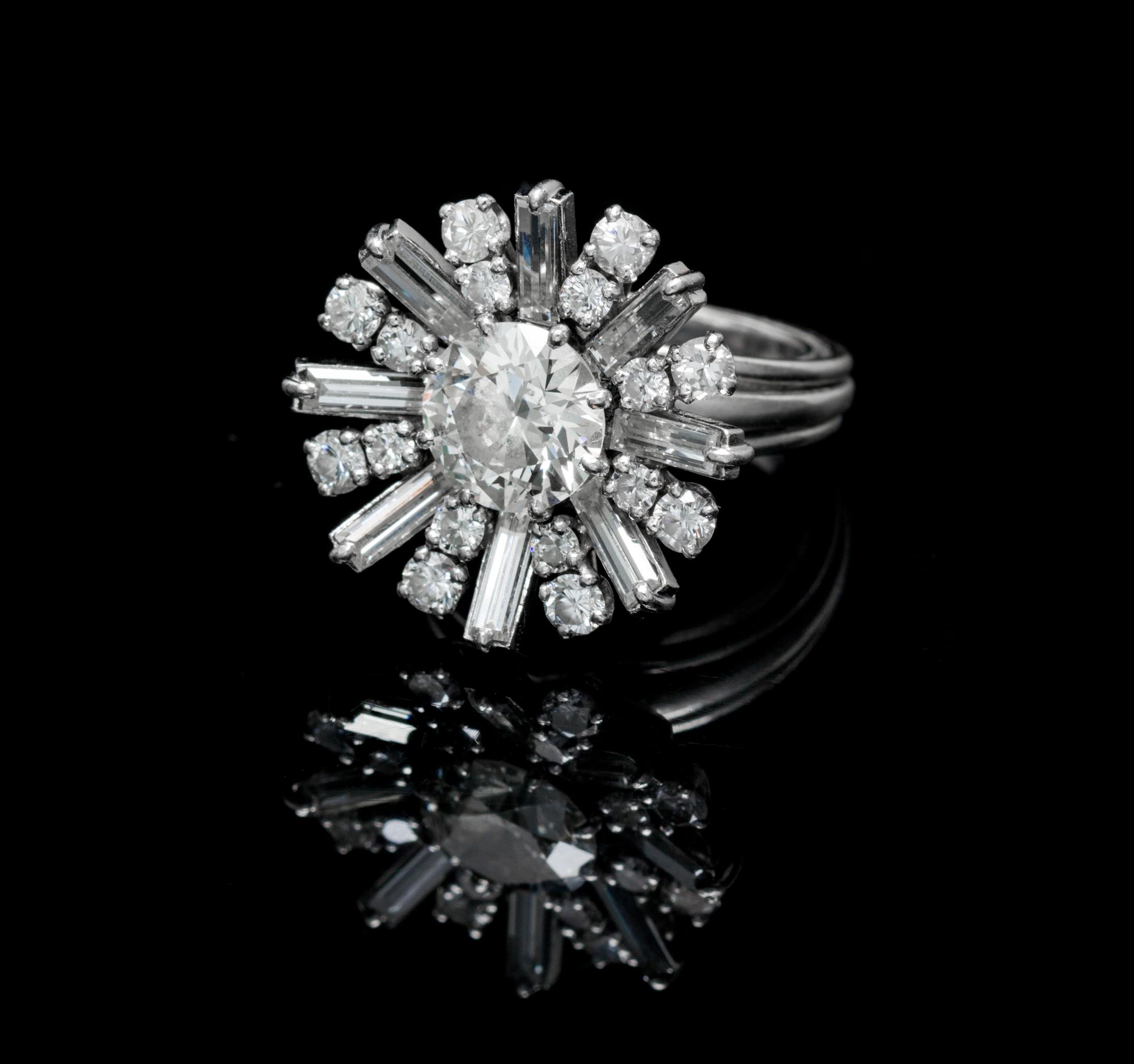 A Platinum, White Gold and Diamond Ring, French, 7.80 dwts.