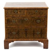 A William & Mary Oyster Veneered Walnut and Holly Inlaid Chest of Drawers Height 30 x width 31 x depth 22 inches. — LATE 17TH CENTURY