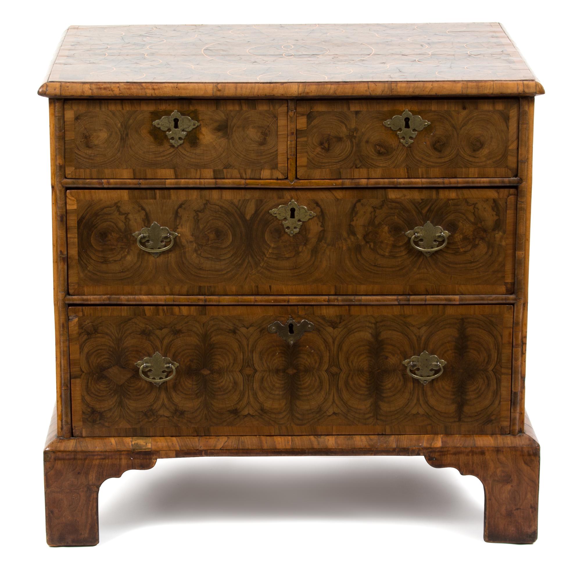 A William & Mary Oyster Veneered Walnut and Holly Inlaid Chest of Drawers Height 30 x width 31 x depth 22 inches. — LATE 17TH CENTURY
