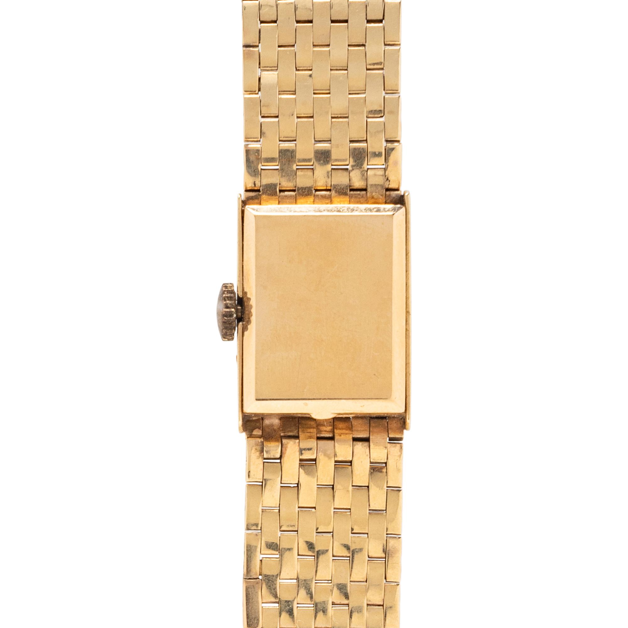 CORUM, YELLOW GOLD WATCH