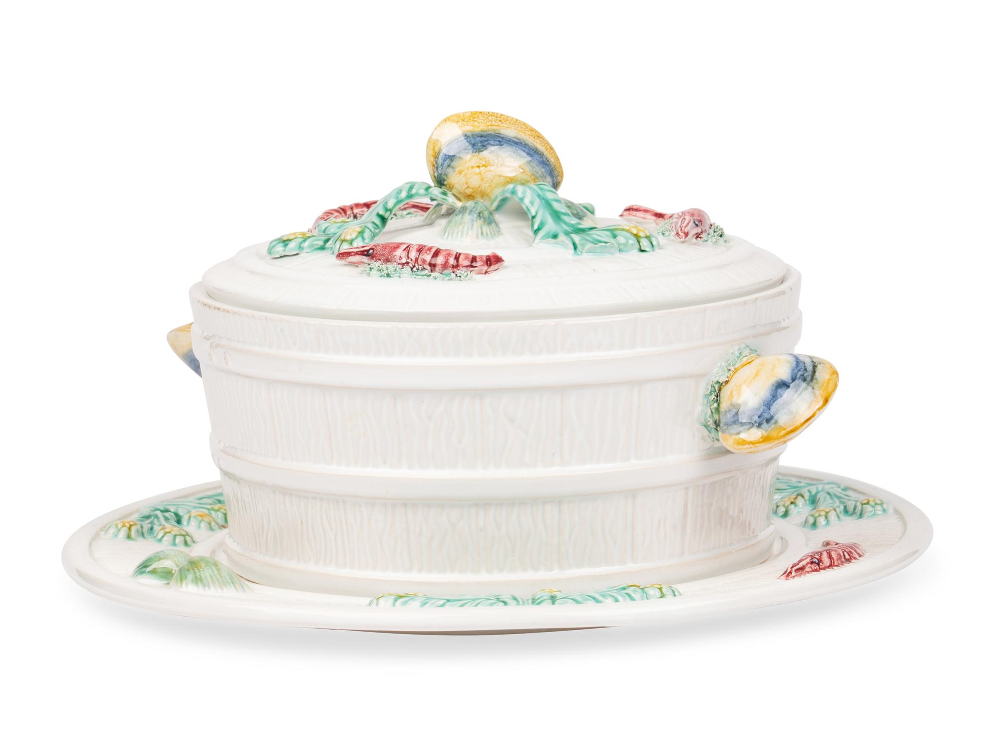 A Mottahedeh Glazed Earthenware Seafood Tureen and Tray