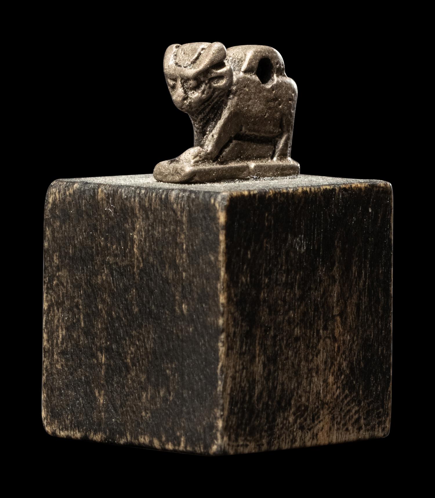 An Egyptian Silver Apis Amulet