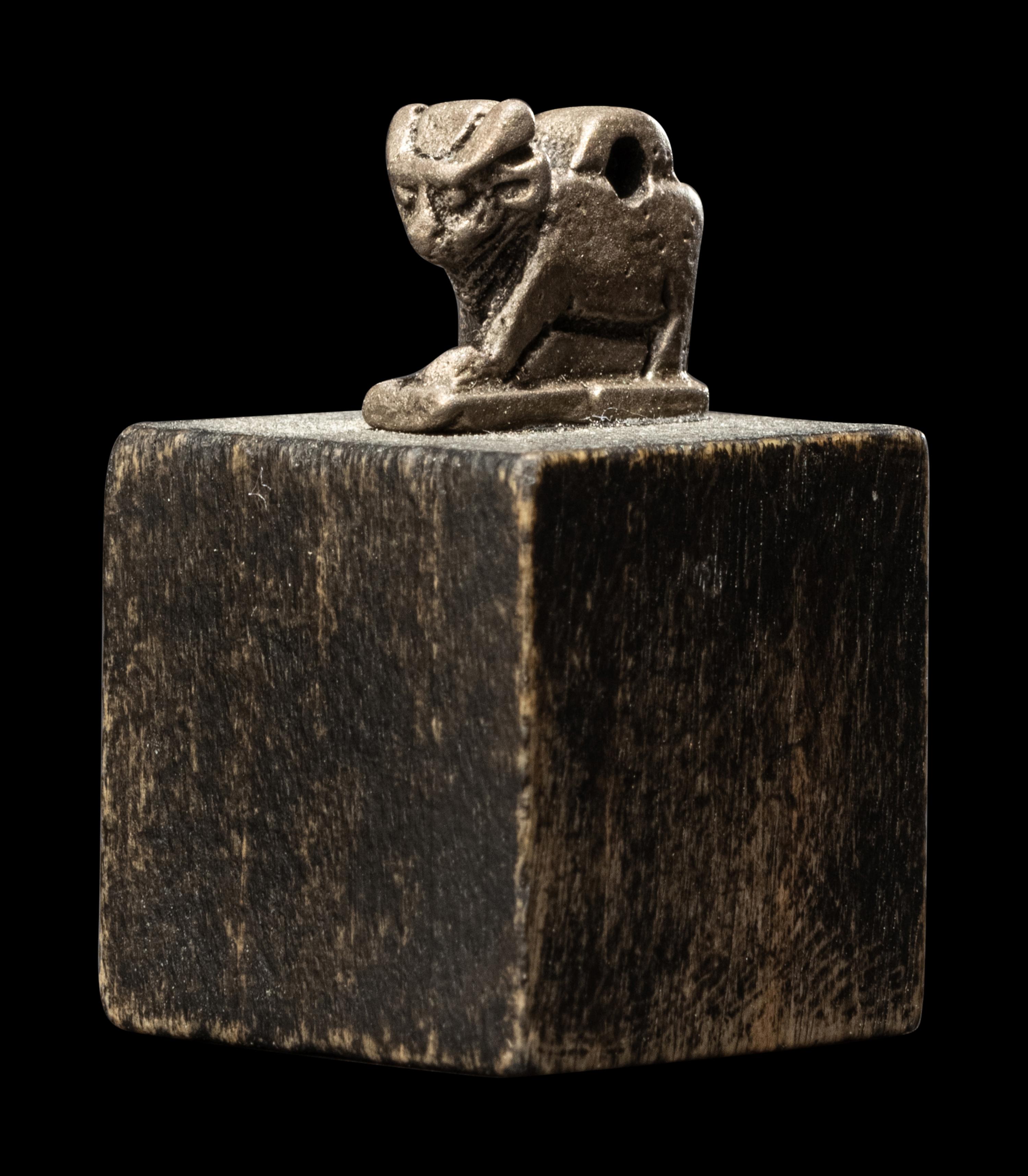 An Egyptian Silver Apis Amulet