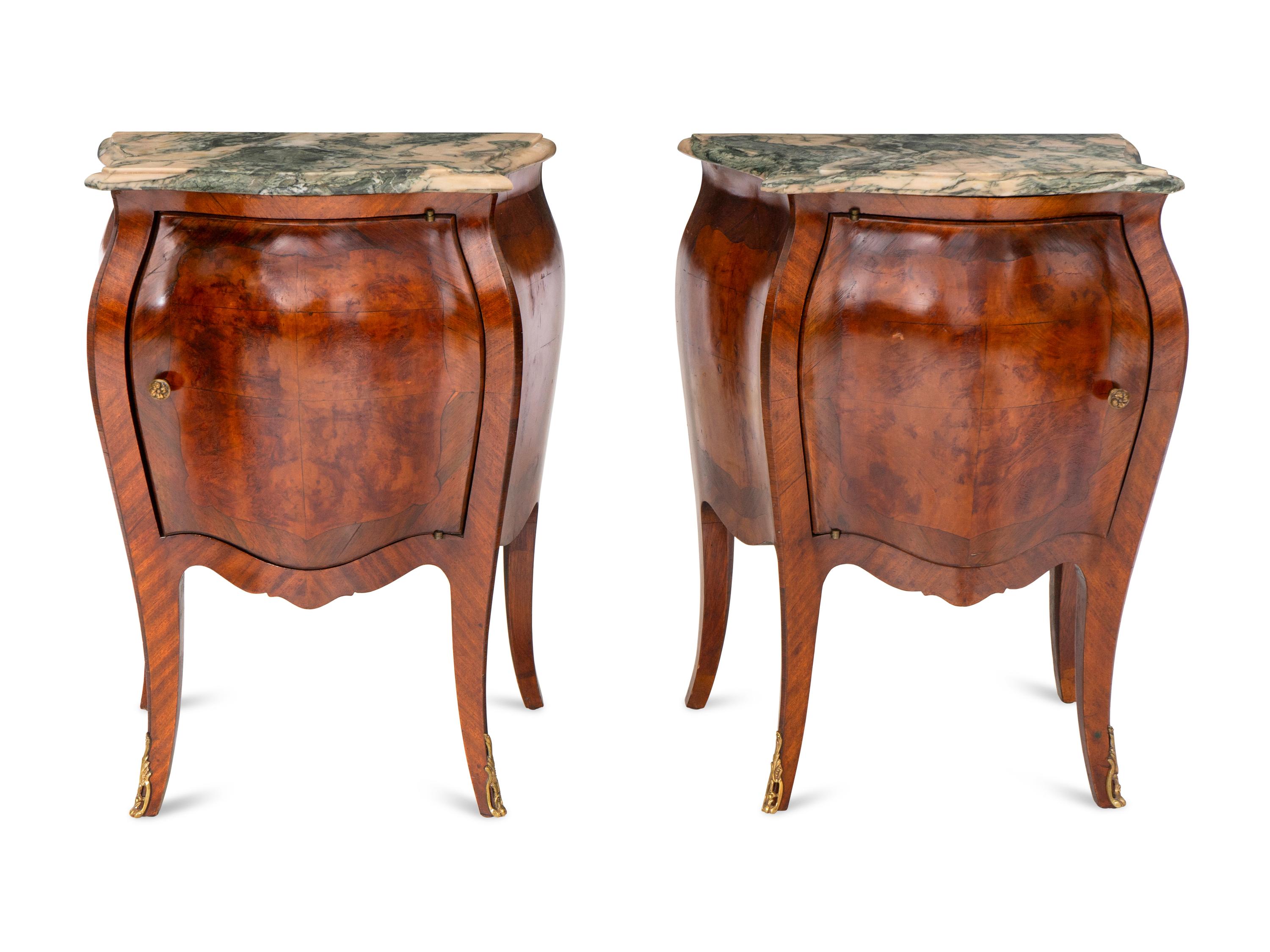 An Italian Bombe-Form Burled Walnut Three-Piece Bedroom Suite with Marble Tops