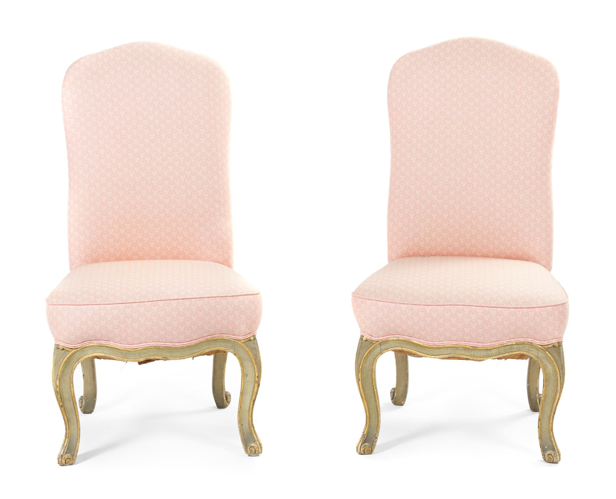 A Pair of Louis XV Style Painted and Parcel Gilt Slipper Chairs, Height 34 1/4 inches.