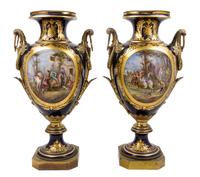 A Pair of Sevres Gilt Bronze Mounted Porcelain Urns Height 30 inches.