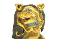 A Sino-Tibetan Gilt Bronze Repoussé Fu-Lion