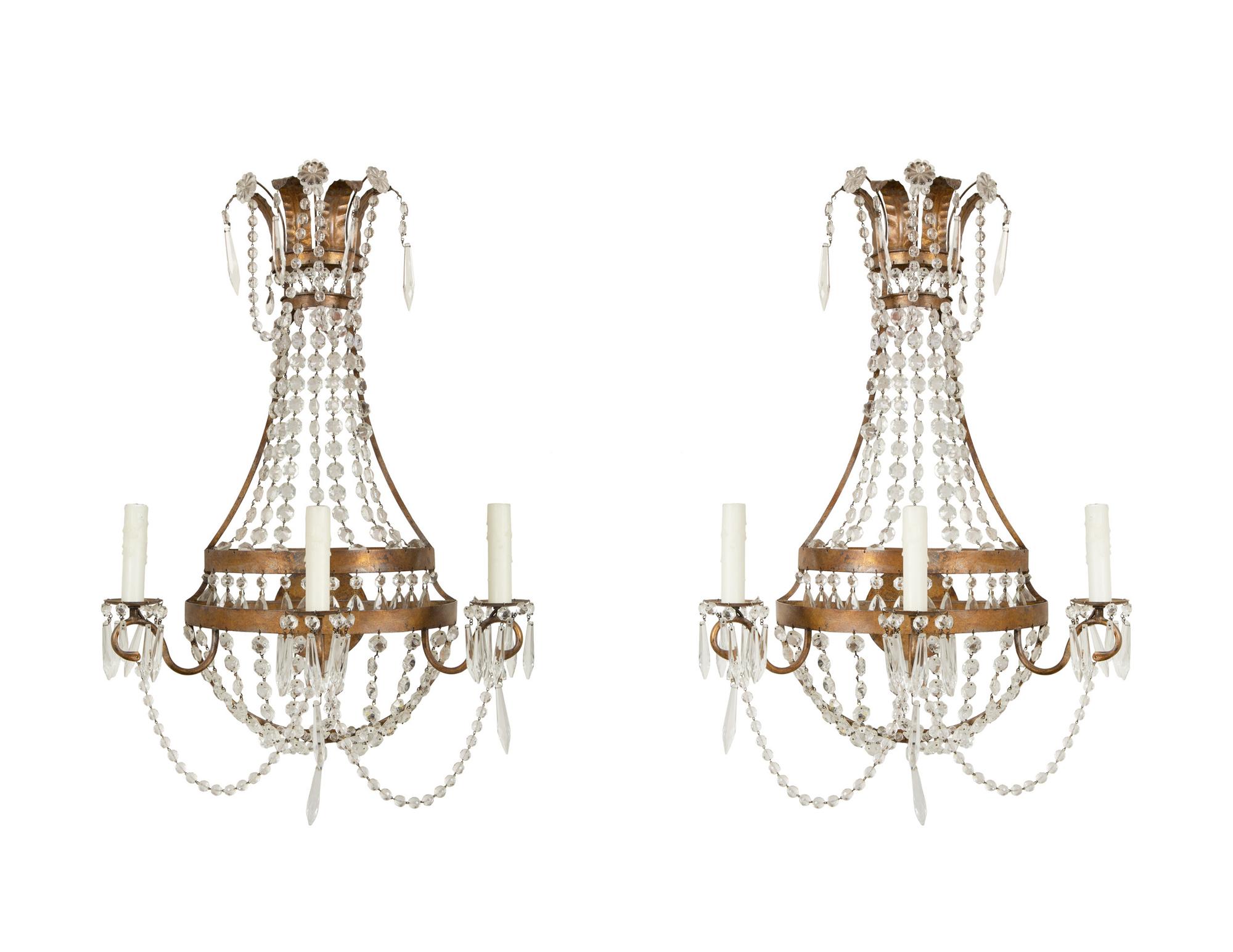 A Pair of Neoclassical Gilt Metal Three-Light Sconces Hung with Cut Glass Beaded Swags