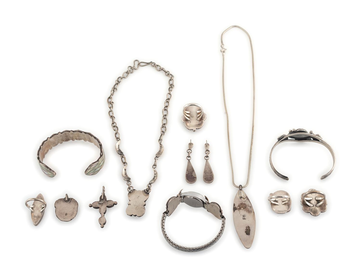 Assortment of Navajo and Zuni Silver and Shell Jewelry