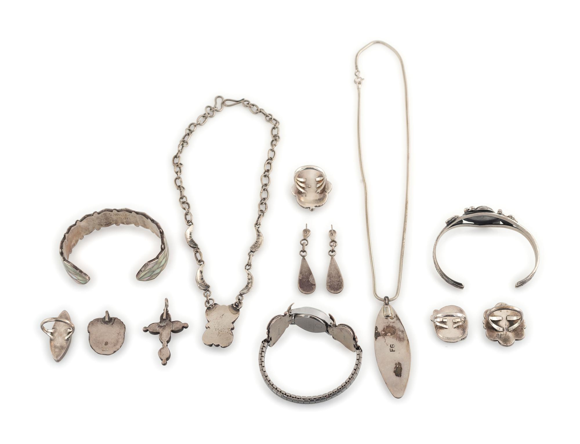 Assortment of Navajo and Zuni Silver and Shell Jewelry