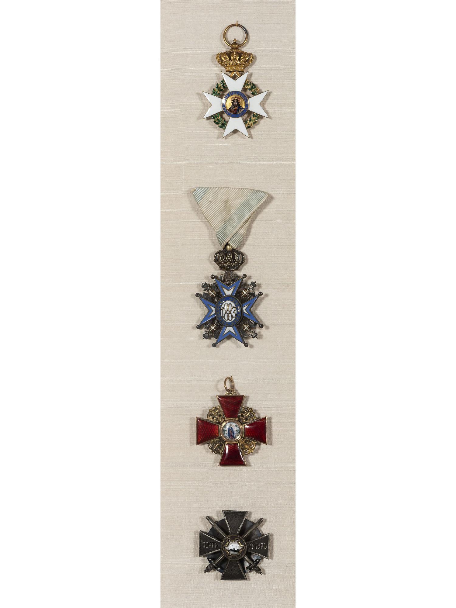 Four Eastern European Order of Merit Badges