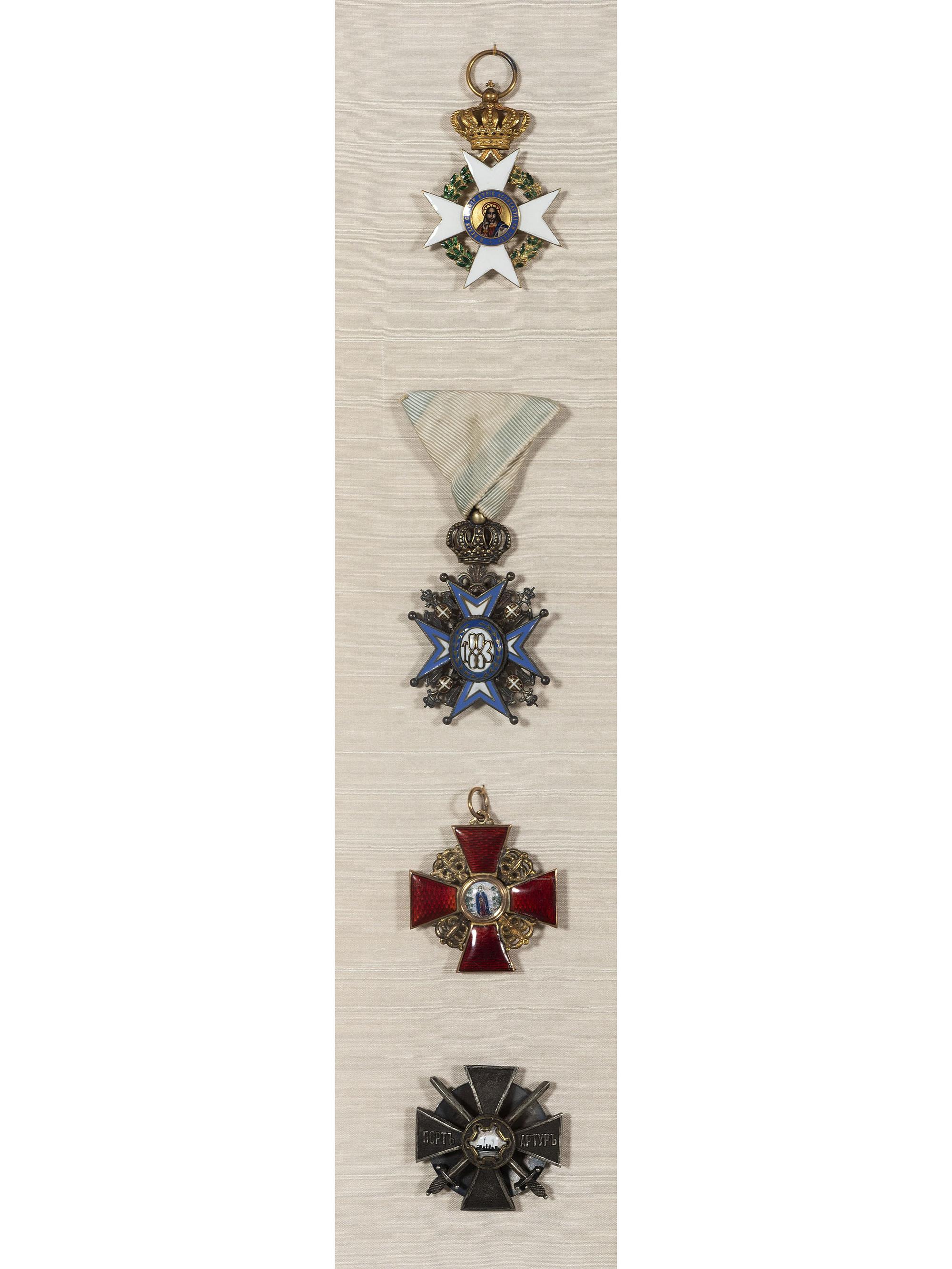 Four Eastern European Order of Merit Badges