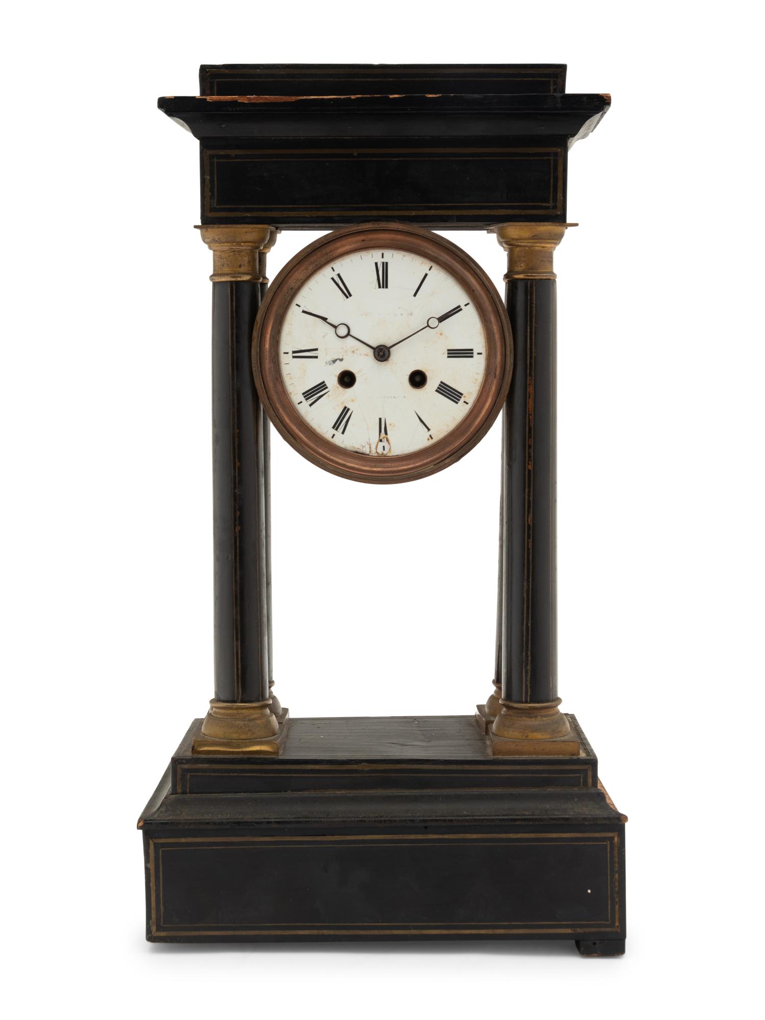 A Charles X Ebonized Mantel Clock