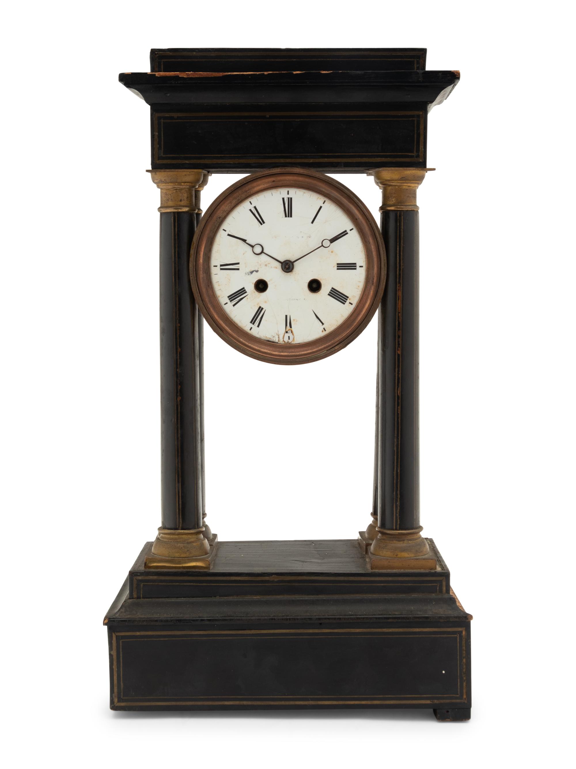 A Charles X Ebonized Mantel Clock