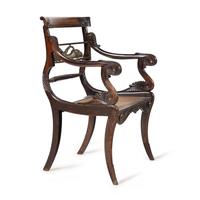 A Regency Rosewood, Mahogany and Brass Armchair