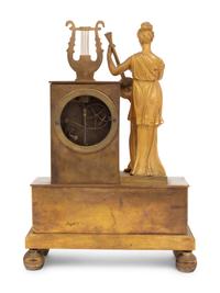 A French Gilt Bronze Figural Mantel Clock