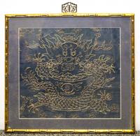 An Unfinished Framed Embroidery of a Dragon Height 12 x width 13 1/4 inches.