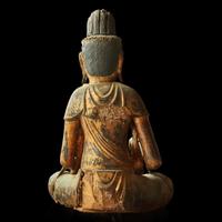 A large Japanese gilt lacquered wood figure of a seated bodhisattva Heian- Kamakura period or later