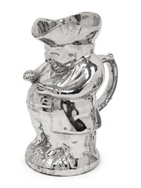 A Staffordshire Squat Toby Jug and a Silver Luster "Snuff Taker" Toby Jug