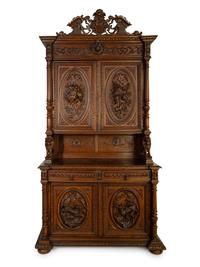 A German Carved Oak Hunt Cabinet
