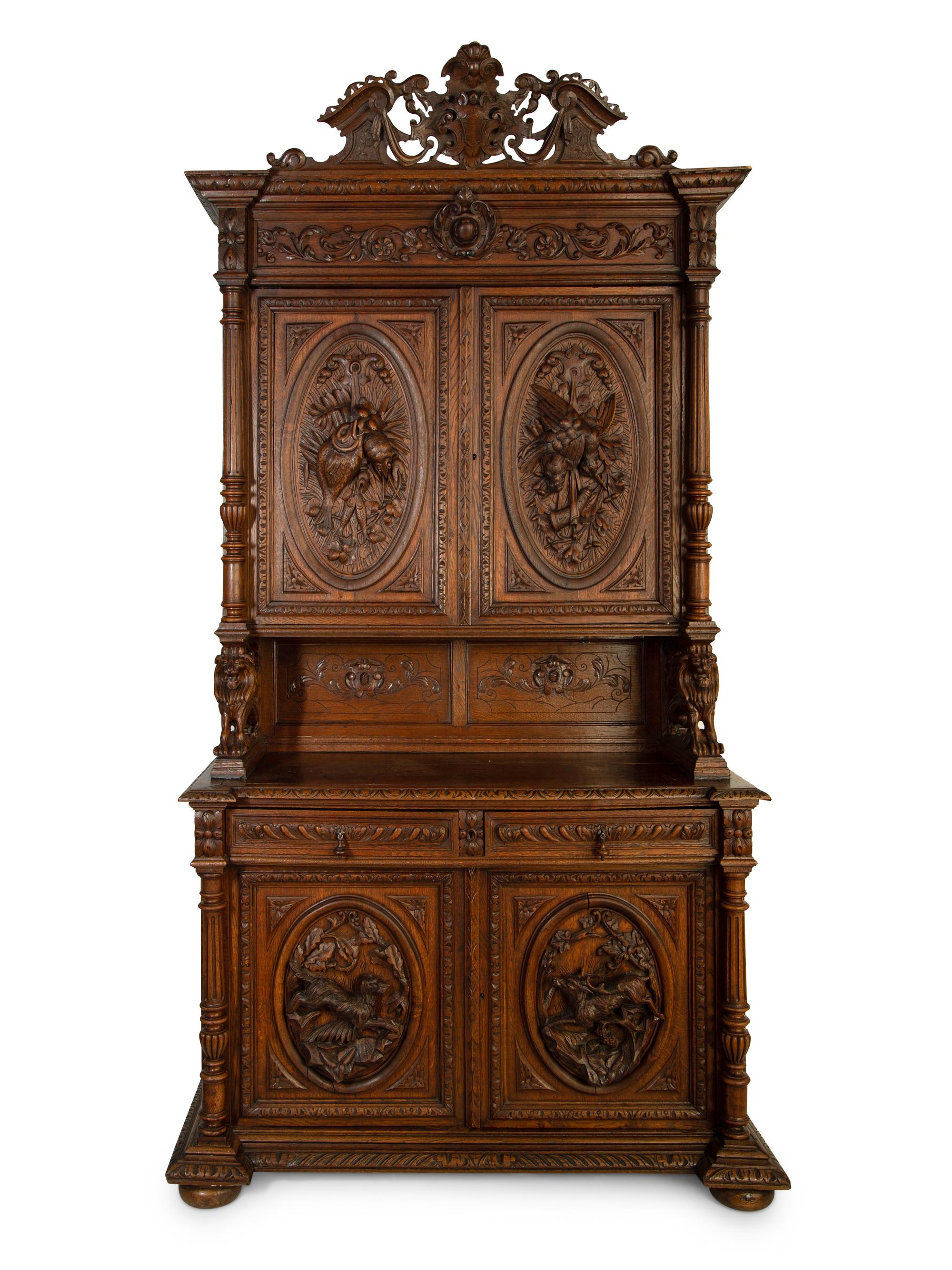 A German Carved Oak Hunt Cabinet