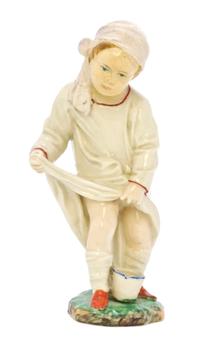 A Hoscht Porcelain Figure, Height 4 1/4 inches.