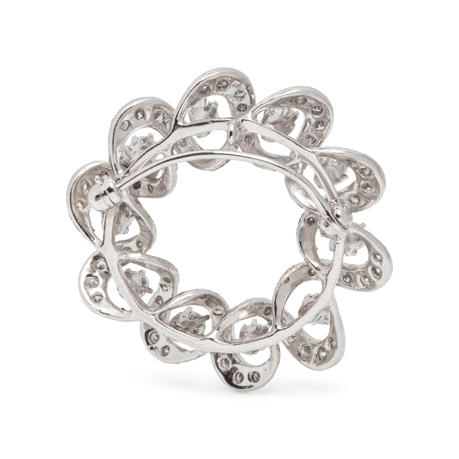 PLATINUM AND DIAMOND CIRCLE BROOCH/PENDANT