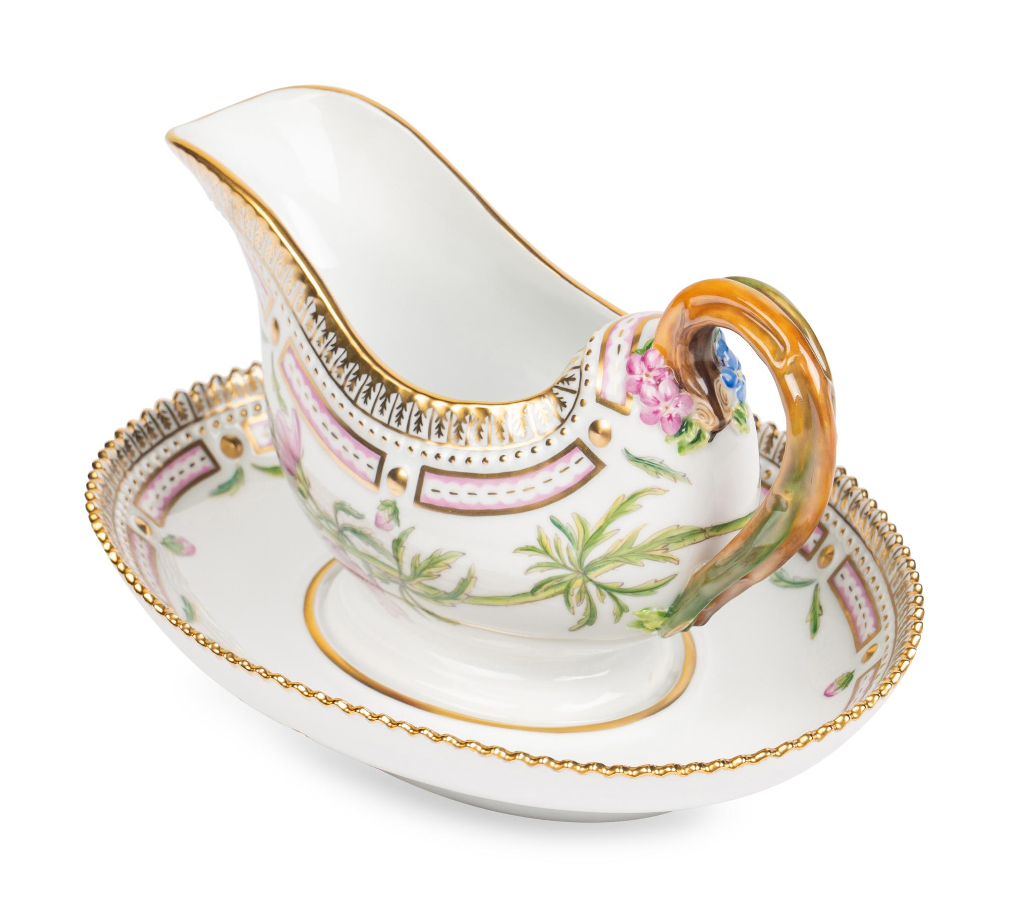 A Royal Copenhagen Flora Danica Porcelain Sauce Boat and Fixed Stand