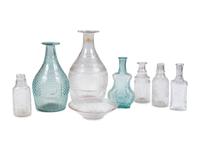 Eight Early American Pattern Molded Glass Bottles and Flasks