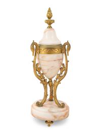 A French Gilt Bronze Mounted Onyx Clock Garniture