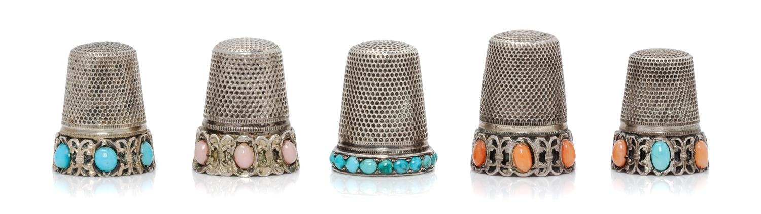 A Group of Five Continental Silver and Stone Thimbles, Various Makers, each having a knurled top and body, two examples with inset cora